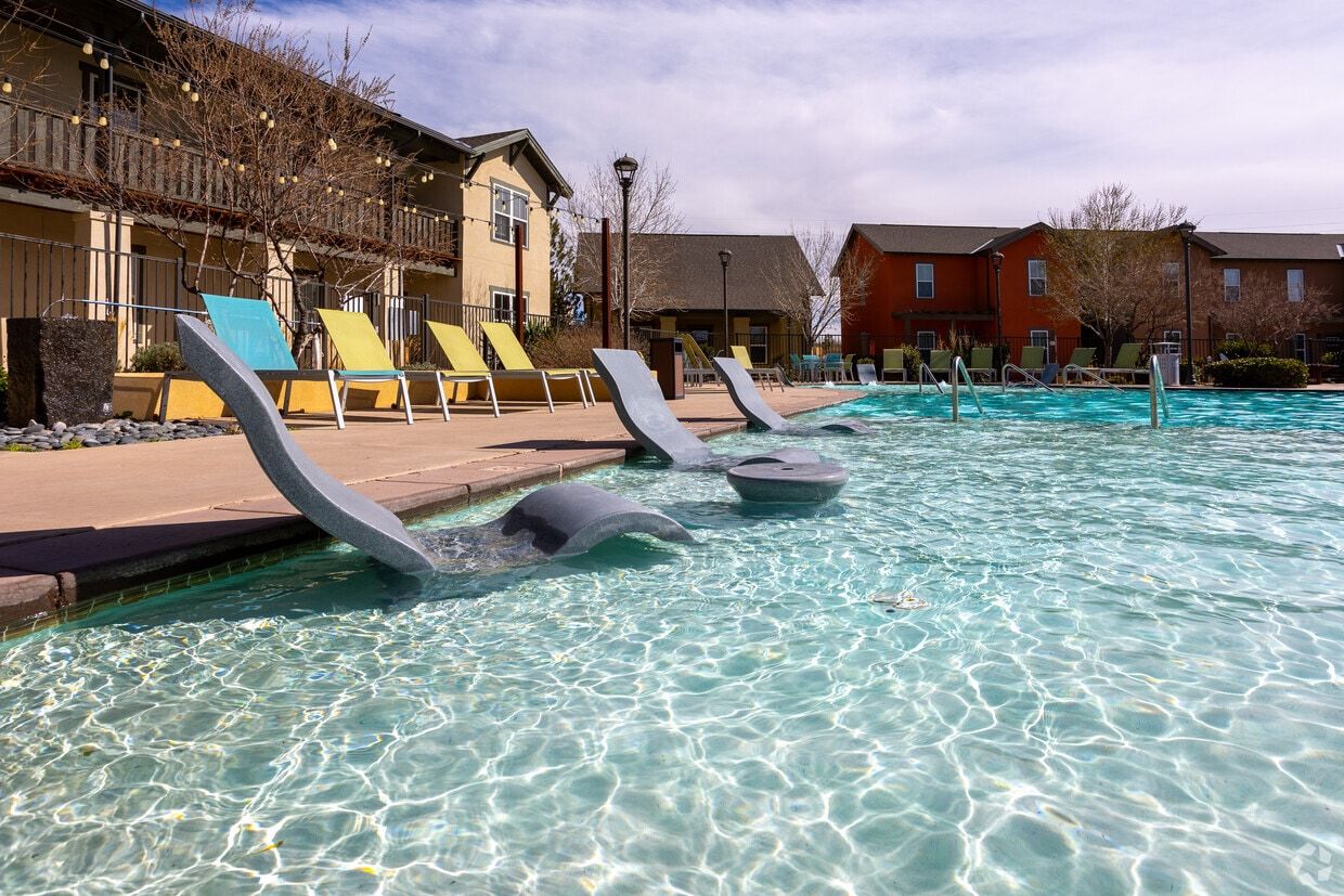 In-pool loungers on the pool's shallow ledge
